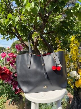Coach Black Pebbled Leather Tote with Red Cherry Charm